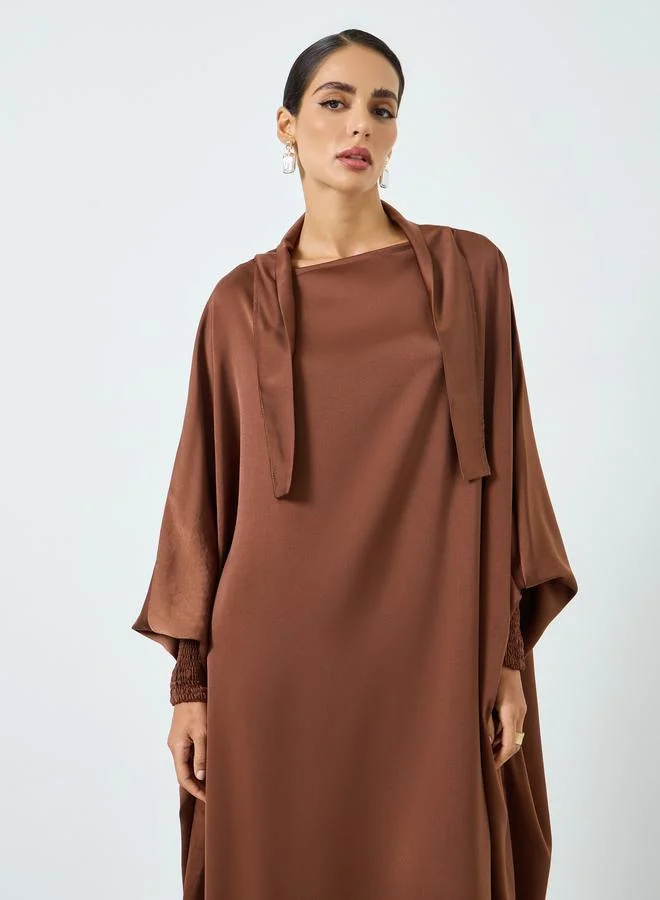 تايك تو جلابية بأكمام خفاش وتصميم واسع من الأسفل